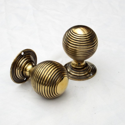 Large Aged Brass Beehive Rim or Mortise Door Knobs